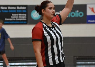 Suncoast Clippers Basketball Clippers Basketball Refs woman referee making a call on court scaled